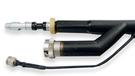 Water-tight sealed fiber optic cable assembly