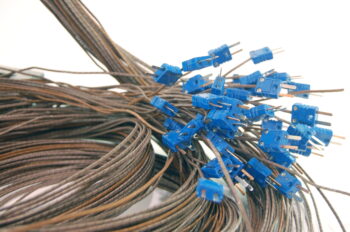 Portplate Hermetic Thermocouple Assembly with integral thermocouple wires and connectors Portplate hermetic thermocouple assembly with integral thermocouple wires and connectors