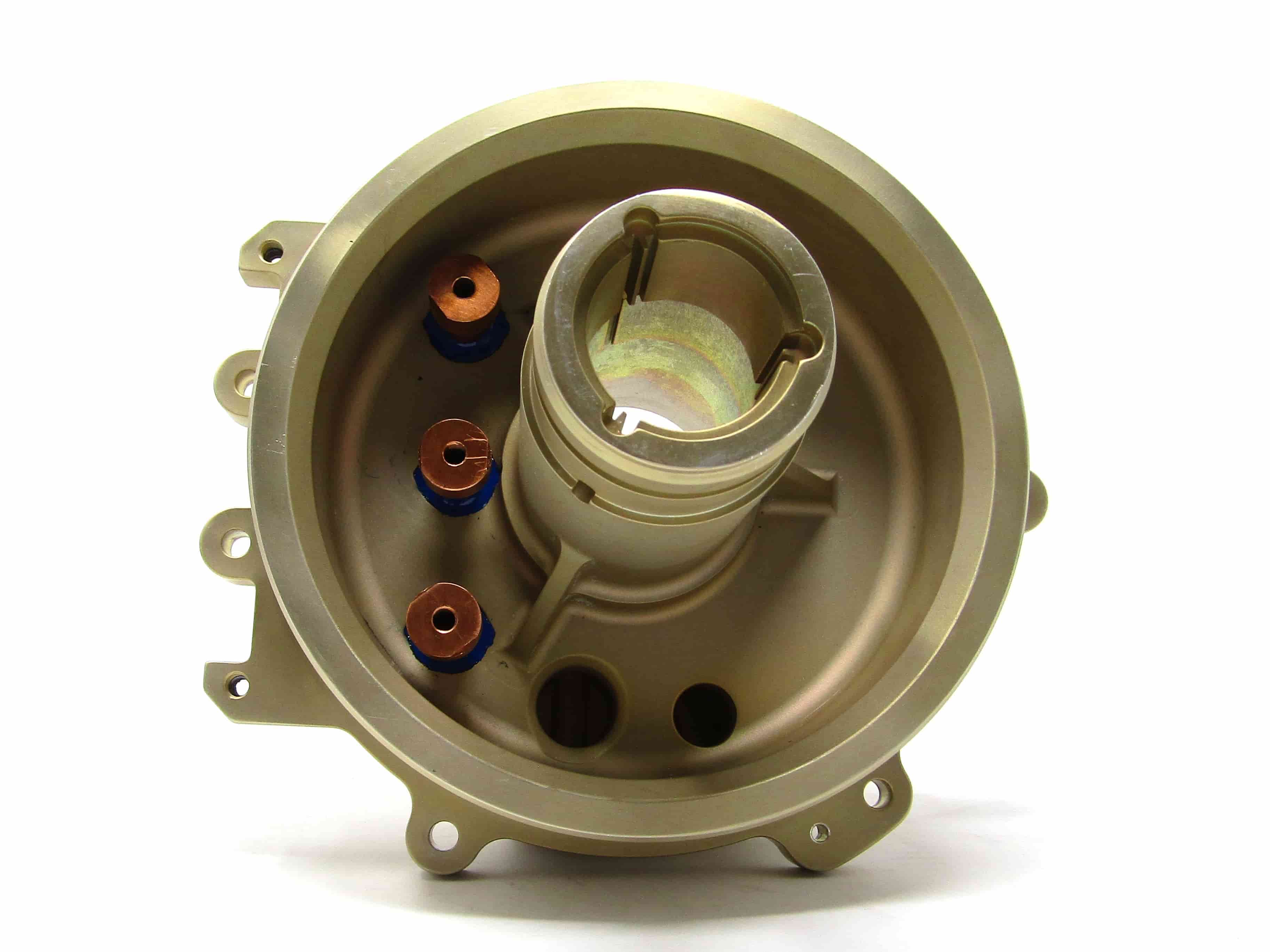 Custom material housing with integral hermetic stud terminations